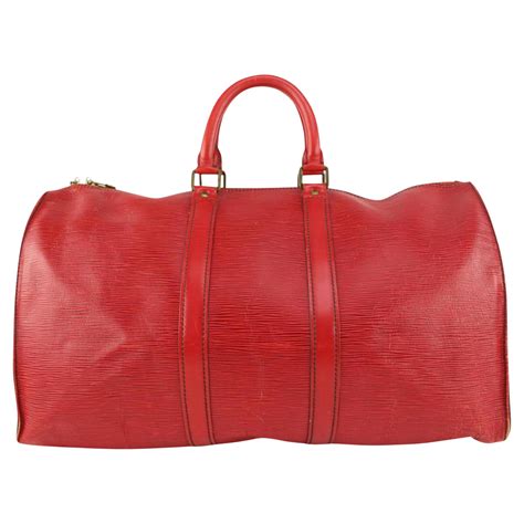 lv red duffle bag